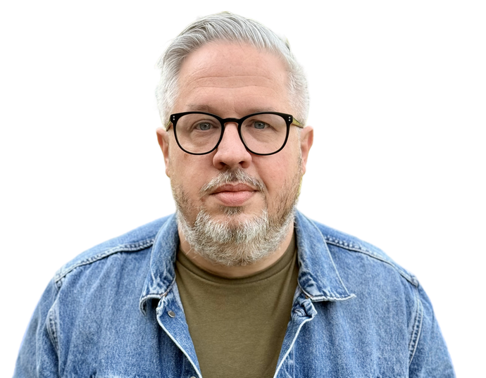 Cutout portrait of Executive Director, Travis Buerky